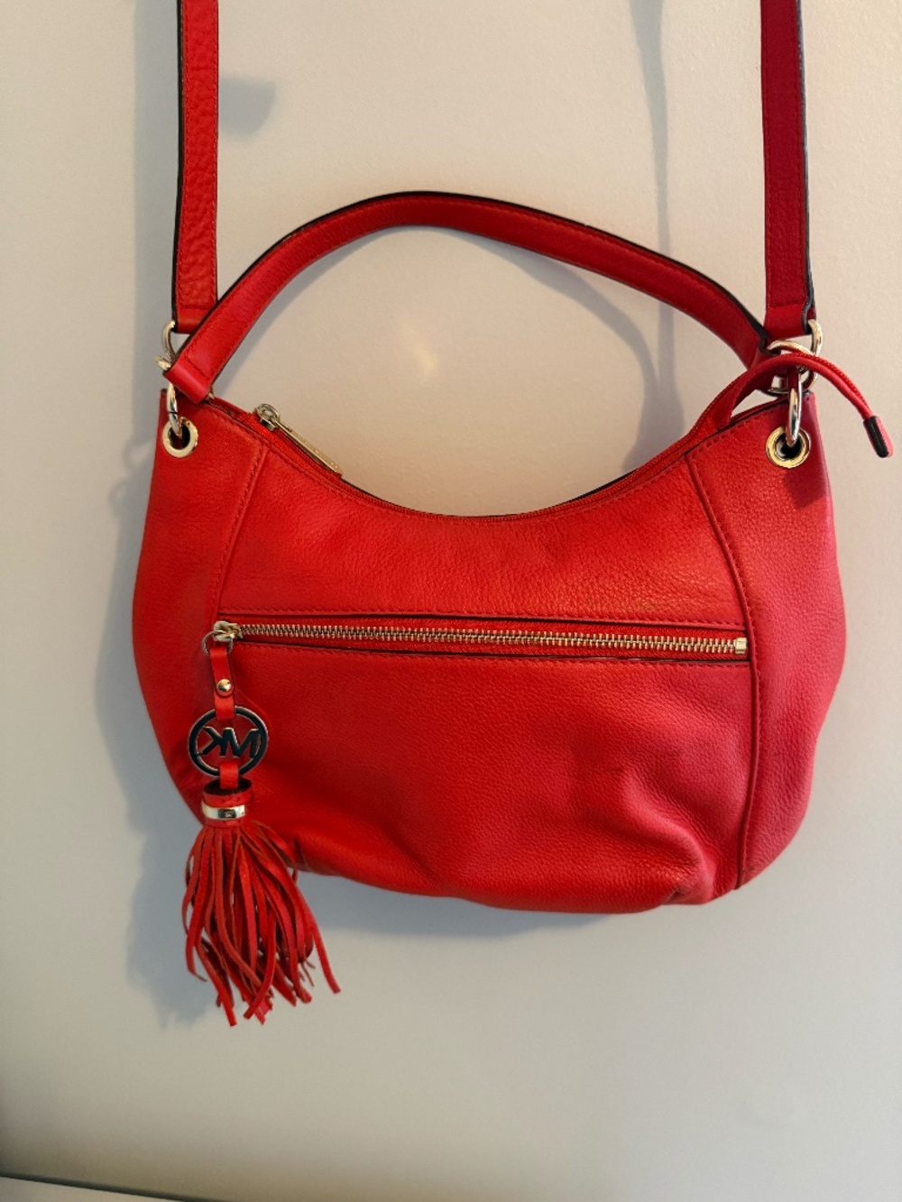 Michael Kors Orange-Red Leather Crossbody Bag with Tassel